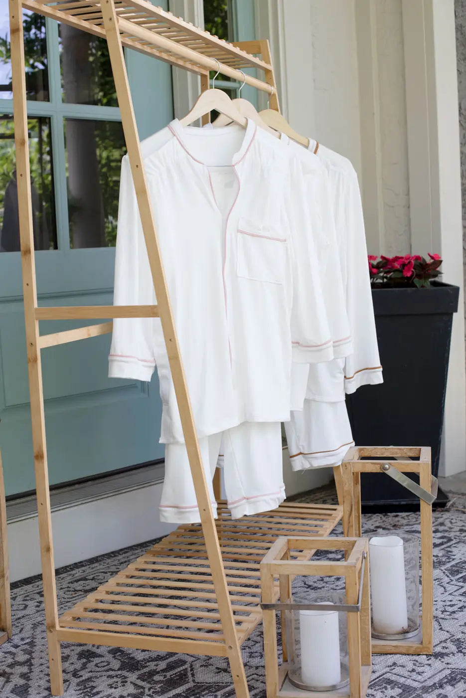 Just Because Love Does Healing Collection medical pajama sets on hangers